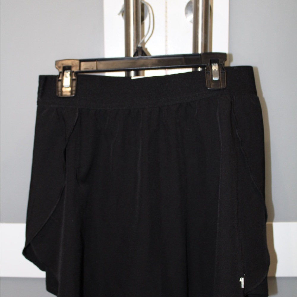 Black Athletic Skort varsity brand size medium
Luxe Flow Skirt